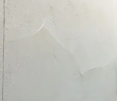 Stucco crack warping