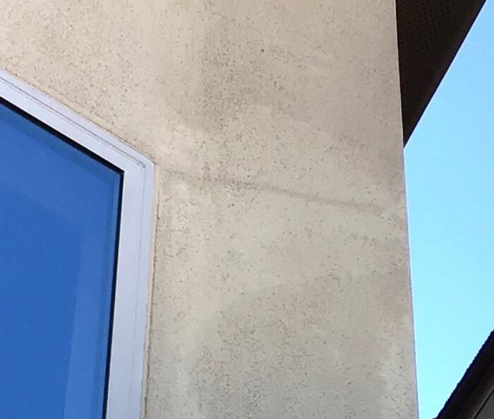 Stucco crack window
